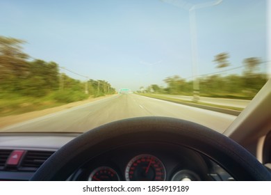 Dangers While Driving On The Road When There Is Light Reflecting The Sun On The Front Of The Car Makes The Road View Unclear.Road Safety Concept