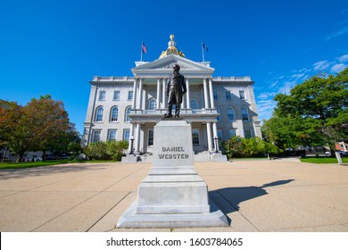 Daniel Webster statue in front of New Hampshire State House, Concord, New Hampshire NH, USA. New Hampshire State House is the nations oldest state house, built in 1816 - 1819.