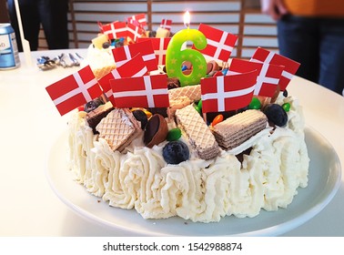 Danish Birthday Cake For A Six Year Old Child With Flags And Candle