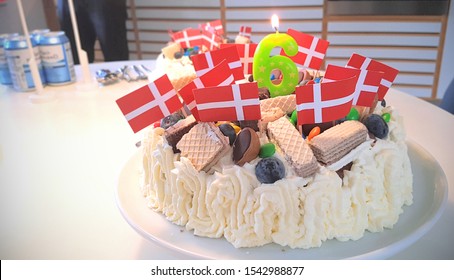 Danish Birthday Cake For A Six Year Old Child With Flags And Candle