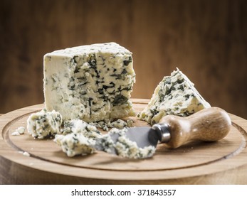 Danish Blue Cheese On A Wooden Board.