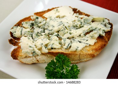 Danish Blue Cheese Spread On To A Crisp Slice Of Toast.