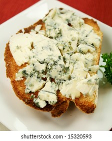 Danish Blue Cheese Spread On To A Crisp Slice Of Toast.