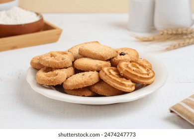 Danish butter cookies. Cheese butter cookies on a white plate. Bright mood. Perfect for recipe, article, catalogue, or any commercial purposes. With copy space.  - Powered by Shutterstock