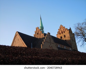 Danish Church And Tower Against Blue Sky