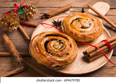 Danish Cinnamon With Chocolate . Sweet Rolls With Cinnamon And Cocoa Filling. Christmas Background