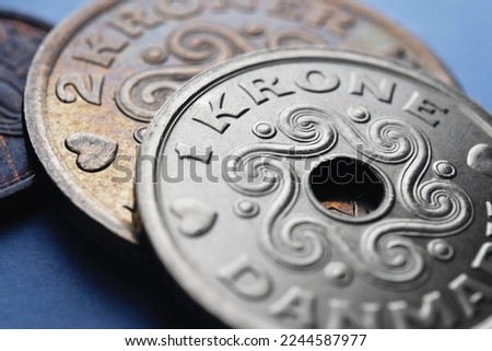 Danish coins. 1 Danish krone coin close-up. National currency of Denmark. Money illustration for news about economy or finance. Bank and loan. Savings and interest. Macro