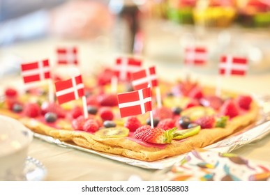 Danish Fruit Pastry For Dessert To Celebrate Patriotism On Constitution Day In June. Annual Holiday Feast In Denmark With National Flags In Food. Fresh Summer Produce On A Baked Puff Pastry