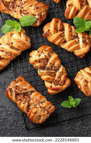 Danish maple syrup, pecan nuts plaits pastry.