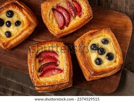 Danish pastries with fruit and custard filling 