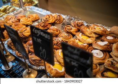 Danish Pastry Traditional Nordic Scandinavian Dessert With Cinammon, Custard, Jam And Sugar Glaze In Local Bakery Display Window In Copenhagen