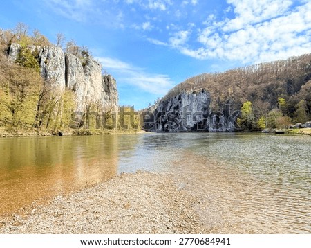 Danube Gorge Limestone Cliffs and River Landscape, Blue Sky, Scenic nature background, Limestone Rock, Calm green waters, Environmental, Commercial, Perfect for Travel, Summer, Pebble Beach, Adventure, Tourism, Bavaria, Natural Landsacpe, Outdoor recreation, European scenery
