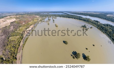 The Danube has flooded large sections of farmland surrounding the village of Báta. This aerial drone view shows the extent of the damage, with vast fields under water as a result of the rising river.