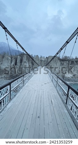 Danyore suspension bridge with old tunnel that used to be the only means of transportation from Gilgit to Danyore, after the establishment of Karakoram international university this bridge is only use