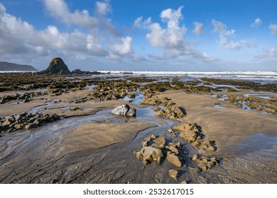 Dappled morning clouds hovering over Black Rock Widemouth North West Cornwall - Powered by Shutterstock