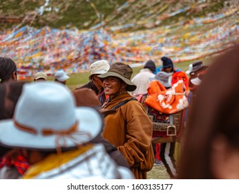 Darchen , Tibet China - August 19 2019: Pilgrims embarking on a sacred pilgrimage around Mt Kailash 