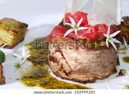 Dariole of limousin - fine beef cutlet with parma ham, new Danish cuisine