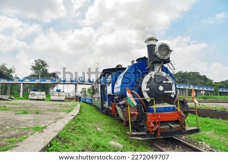 Darjeeling Himalayan Railways toy train heading to the Darjeeling from Siliguri station. The most attractive tourist ride of this region which is recognized as UNESCO world heritage site.