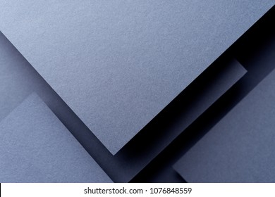Dark abstract background inspired by material design using cardboard and paper - Shutterstock ID 1076848559