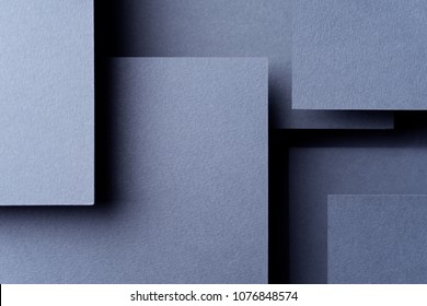 Dark abstract background inspired by material design using cardboard and paper - Shutterstock ID 1076848574