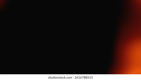 A dark abstract background with an orange gradient. Its a filmlike texture with a light leak effect.