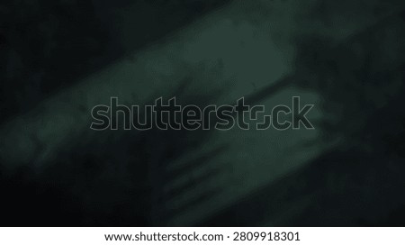 A dark, abstract background with subtle diagonal streaks of light in a deep green hue, creating a moody and atmospheric effect.