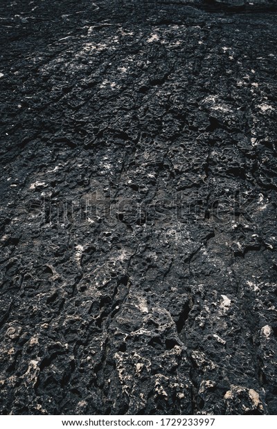 Dark Aged Shabby Cliff Face And Divided\
By Huge Cracks And Layers. Coarse, Rough Gray Stone Or Rock Texture\
Of Mountains, Background And Copy Space For Text On Theme Geology\
And Mountaineering.