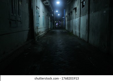 Dark Alley After Rainy Day