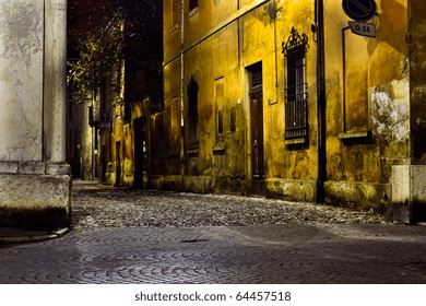 Dark Alley At Night, Narrow Dirty Corner, Street  In The Old Town