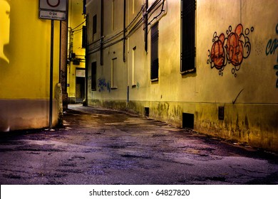 dark alley at night, narrow dirty corner of decadent old town, graffiti on grunge wall