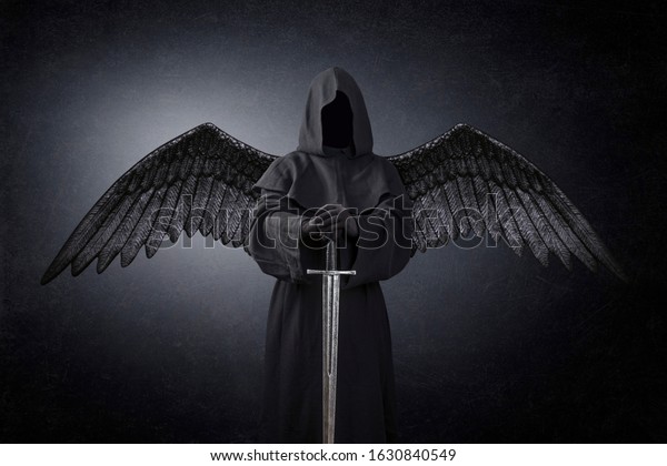 Dark angel with
medieval sword in the dark