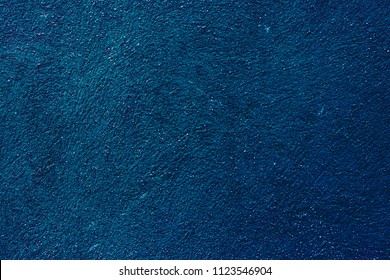 Dark Aquamarine Wall With Cracked Facade. Background.