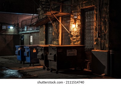Dark back ally at night, Calgary - Shutterstock ID 2111514740