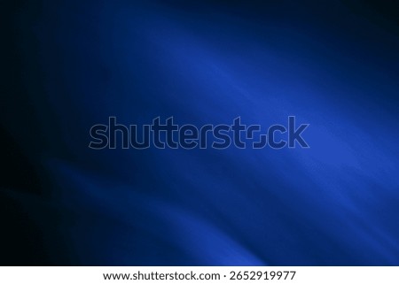 Dark Background with Blue Light Motion Creating Soft Movement for Backdrop, Creative Design Template, and Overlay