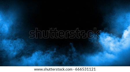 Dark background full of dense, white smoke