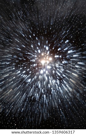 dark background of lights shaped as a explosion of stars with smoke mist and traces of light speed like a time jump on science fiction movie or a super nova explosion