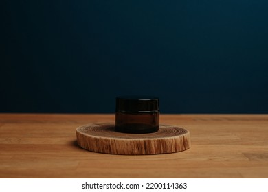 Dark background and natural wooden desk with copy space