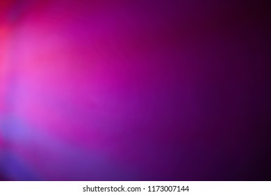 Dark background with pink and purple hues