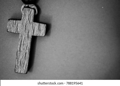 Dark Background With A Rosary Cross,