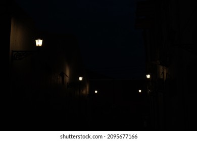 Dark background with rows of lights