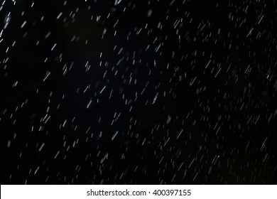 Dark Background Shot Of Rain Falling