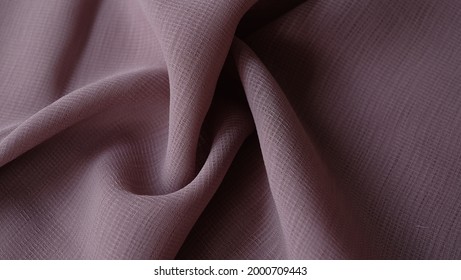 Dark beige color viscose fabric texture seamless with beautiful closeup detail fabric. Luxury textile pattern with soft and delicate material, sometimes this fabric is called cornskin fabric.