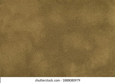 Dark beige matte background of suede fabric, closeup. Velvet texture of seamless brown textile, macro. Structure of khaki felt canvas backdrop. - Shutterstock ID 1888080979