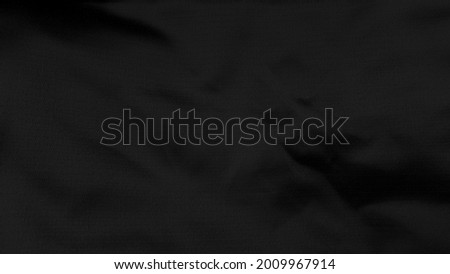 dark black creased silk fabric texture background. close up of black satiny fabric texture background use for luxury, elegant, softness concept with space for design.