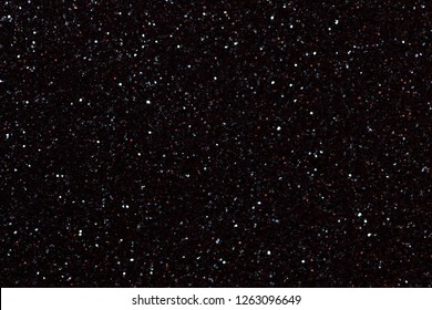 Dark Black Sparkling Background From Small Sequins, Closeup. Brilliant Shiny Backdrop From Textile. Shimmer Paper