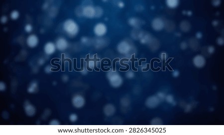 A dark blue abstract background with soft, out-of-focus glowing bokeh lights and particles creating a magical atmosphere.