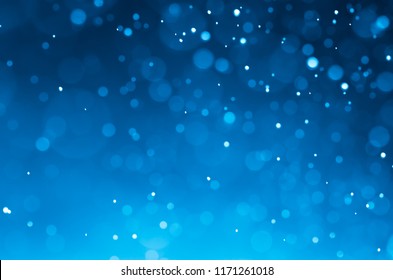 Dark blue abstract backgrounds with bokeh.