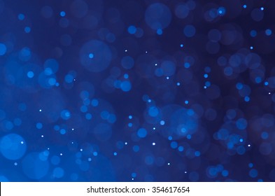 Dark blue abstract backgrounds with bokeh