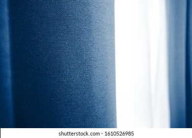 dark blue blackout curtains   white tulle in the bedroom  bedroom decor  bedroom in blue color scheme  the color tranquility