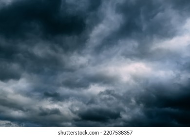 A Dark Blue Cloudy Sky. Cumulus Clouds. Nature Background. Bad Weather Forecast. Before A Thunderstorm, Hurricane Or Storm. The Power And Strength Of Nature. Air Element. Wallpaper. Moving Ciclone.